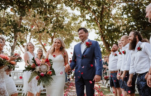 A couple walking to their ceremony